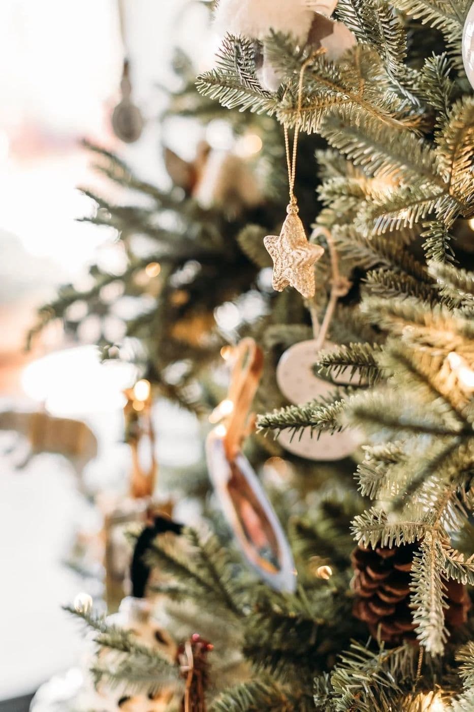 Close view of a Christmas tree with handmade ornaments